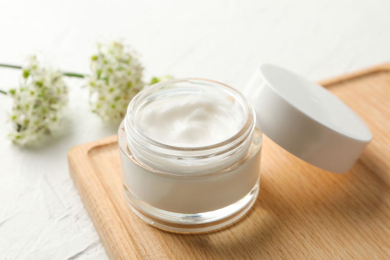white face cream on a table used for skin health