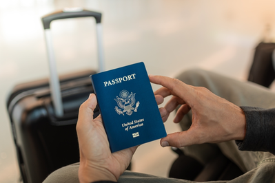 traveler holding US passport